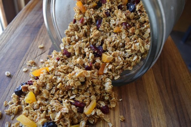 homemade granola coming out of jar