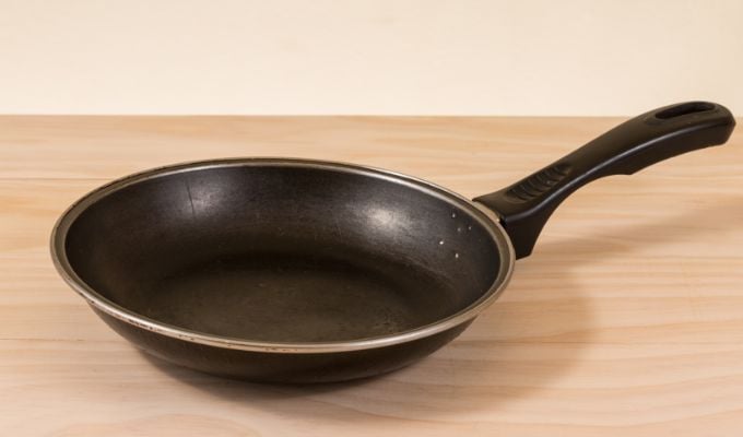 old non stick pan on counter